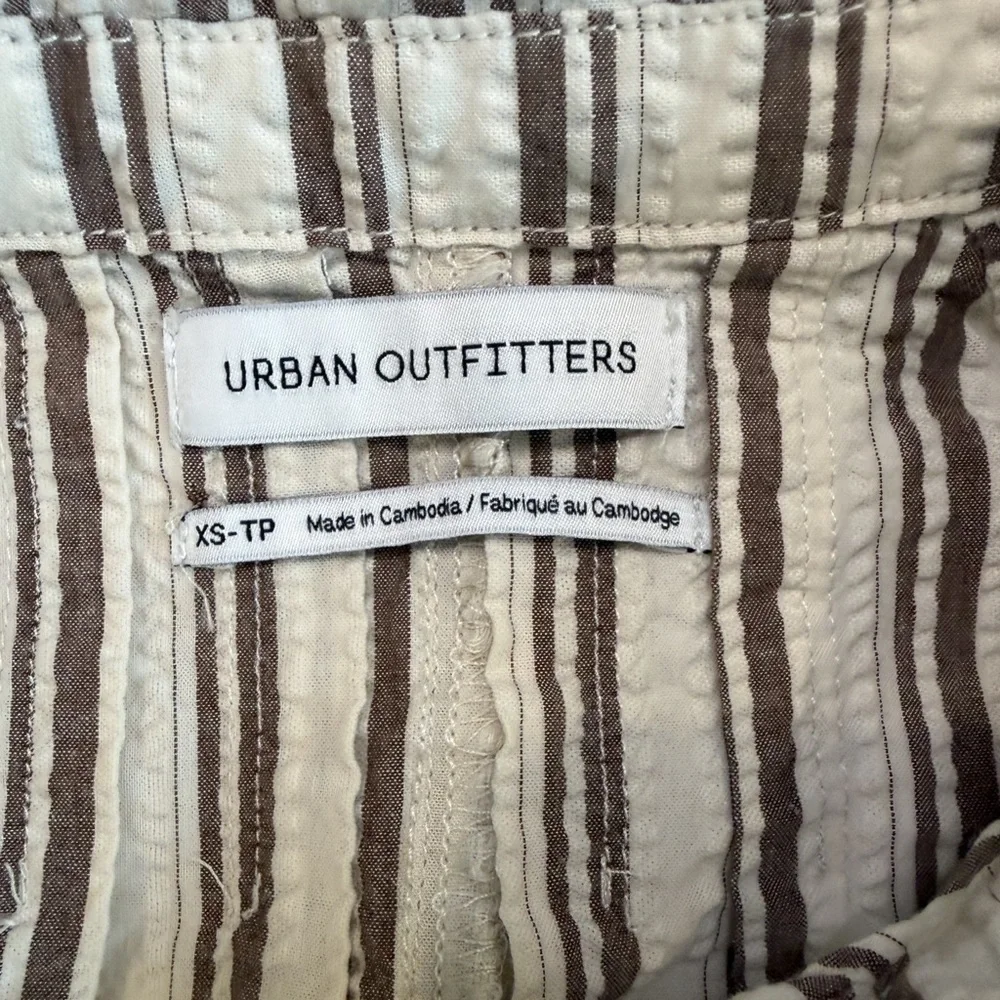 Urban Outfitters Sleeveless Striped Romper in Cream and Brown
